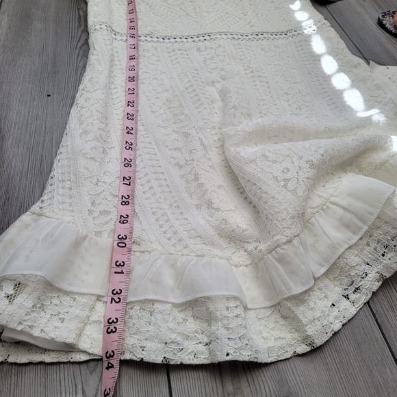 Elegant White Lace Sleeveless Dress - Picture 10 of 12